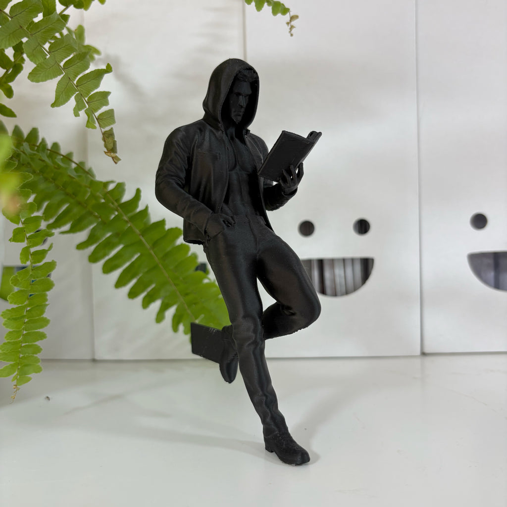 Lesender Mann mit Hoodie Buchstütze – Cozy & Romance 3D Lesezeichen & Bücherregal-Deko